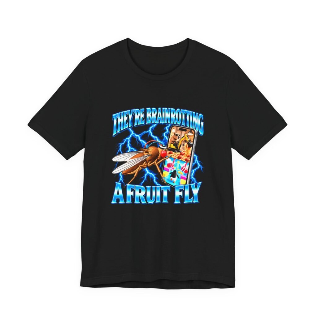 Black t-shirt printed with a fruit fly staring at a phone in blue lightning, between the words They're brainrotting a fruit fly