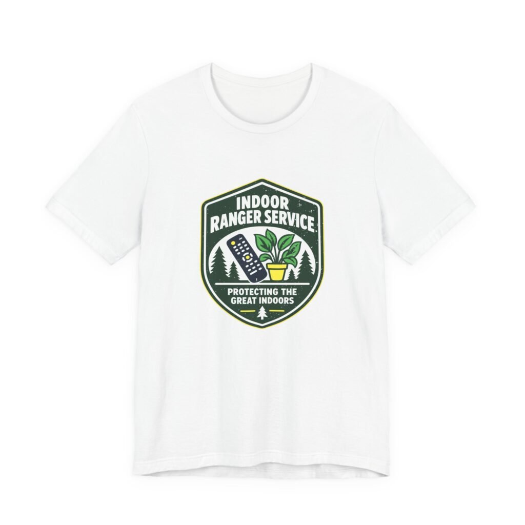 White t-shirt printed with a badge showing a television remote and a houseplant, reading Indoor Ranger Service, protecting the great indoors