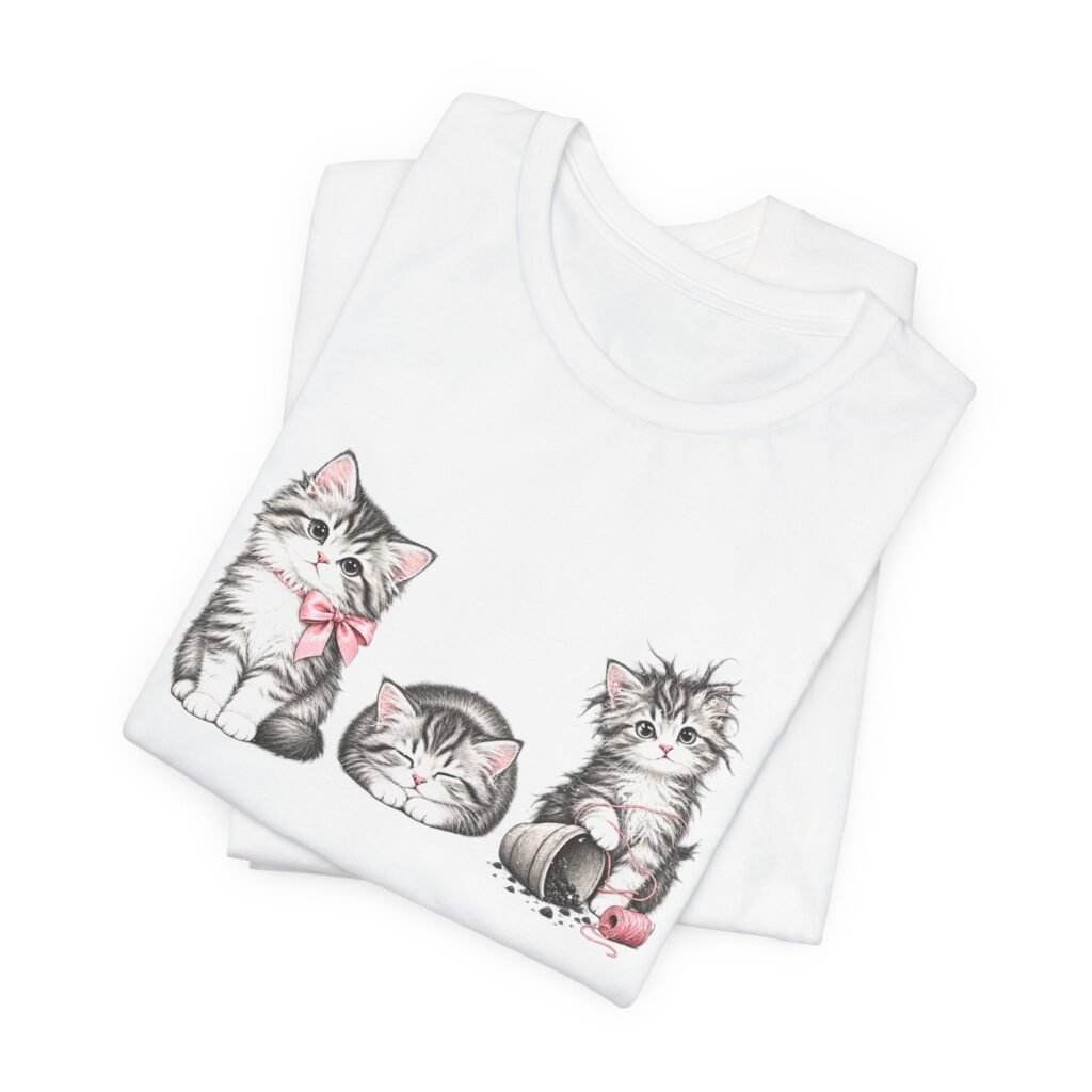 Three Kittens Playing With Yarn and a Pink Bow